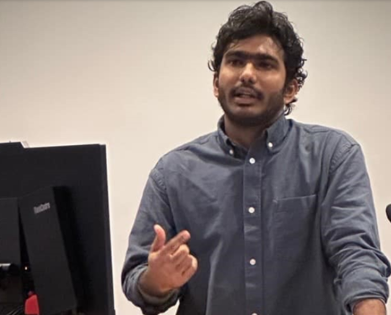 Akhil gives a presentation.