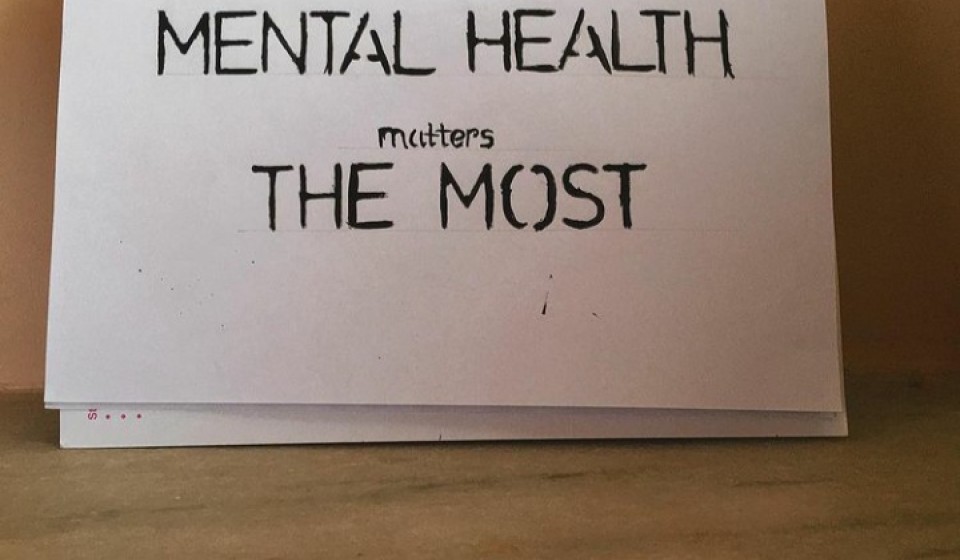 The picture of a sign that says "mental health matters the most"
