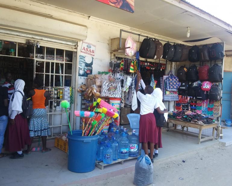 Secondary school students purchasing sports gears at Mbezi shop in Tanzania,14 March, 2019 photo by Berthold Bonn