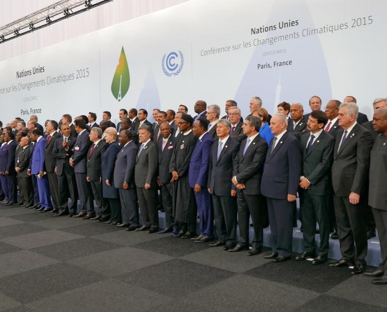 A group photo of world leaders  in 2015 United Nations Climate Change conference which ended with Paris Agreement
