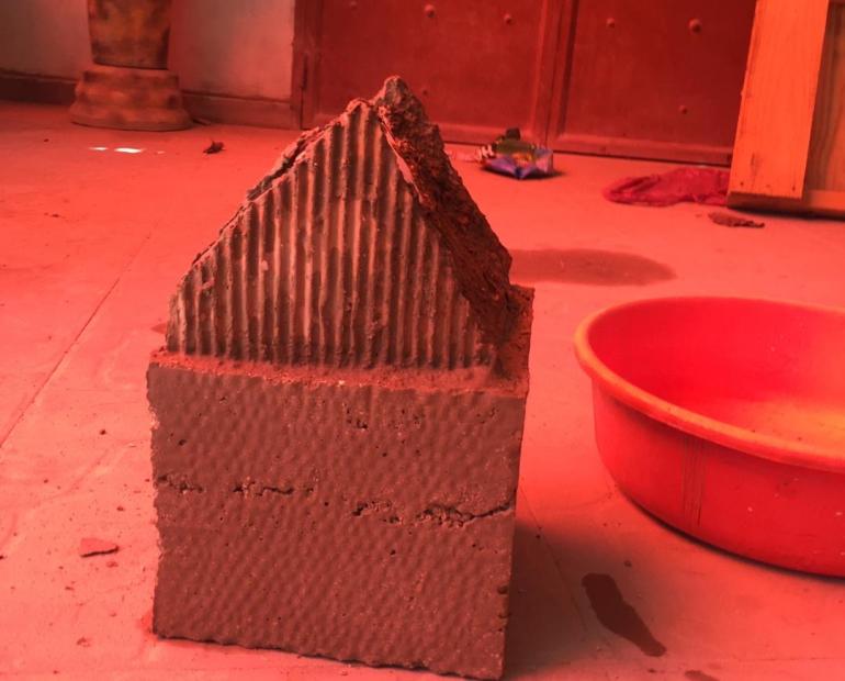 it a house made out of cement and sand