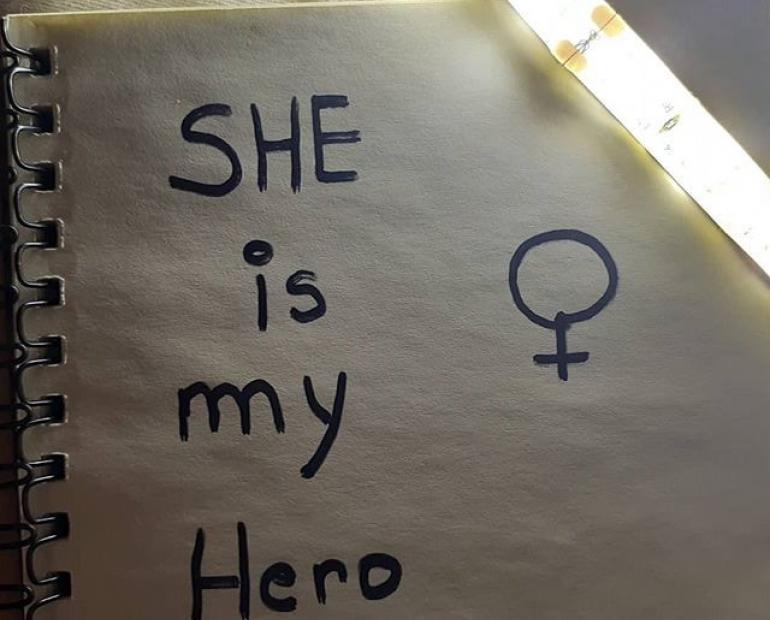 ''She is my hero'' written on a paper