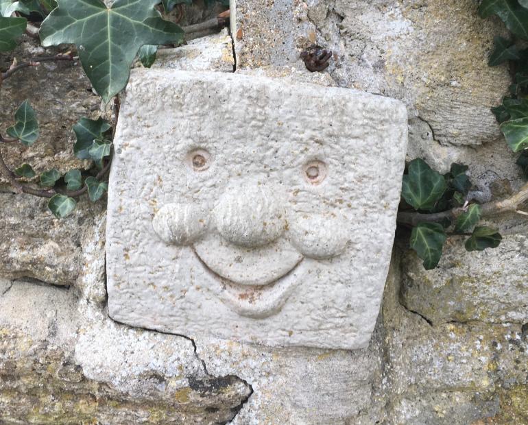 Smiling rock gargoyle thing