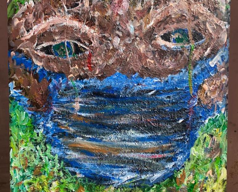 I painted a person's face covered with a blue facemask.