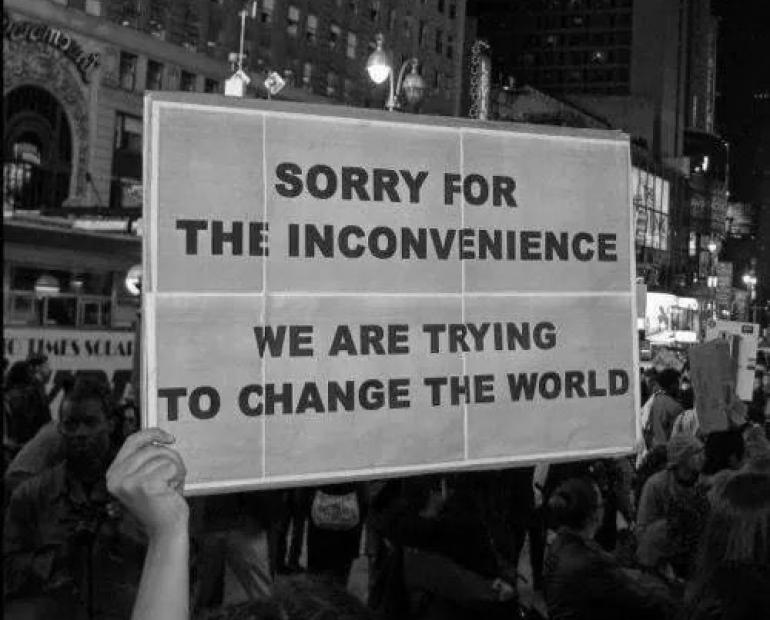 sorry for the inconvenience. we are trying to change the world sign