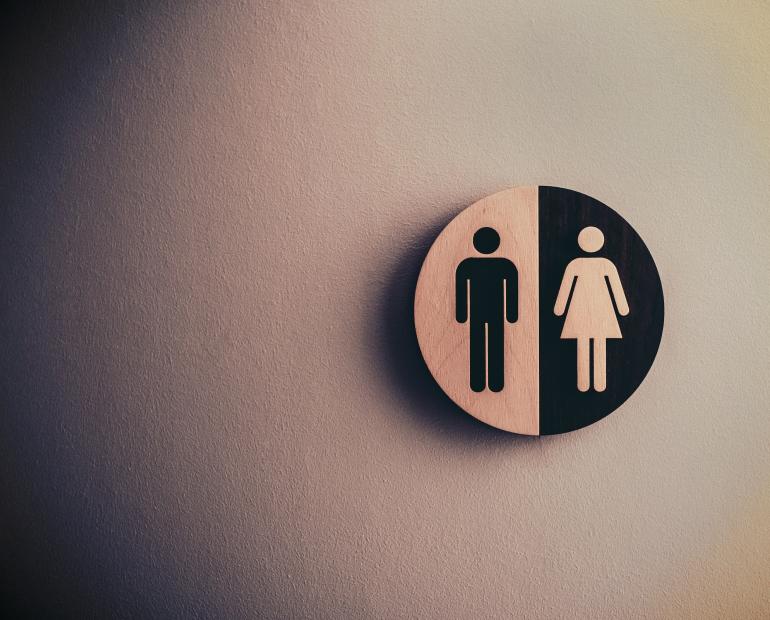 A sign representing men and women.