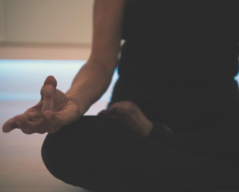 A person holding a yoga pose.