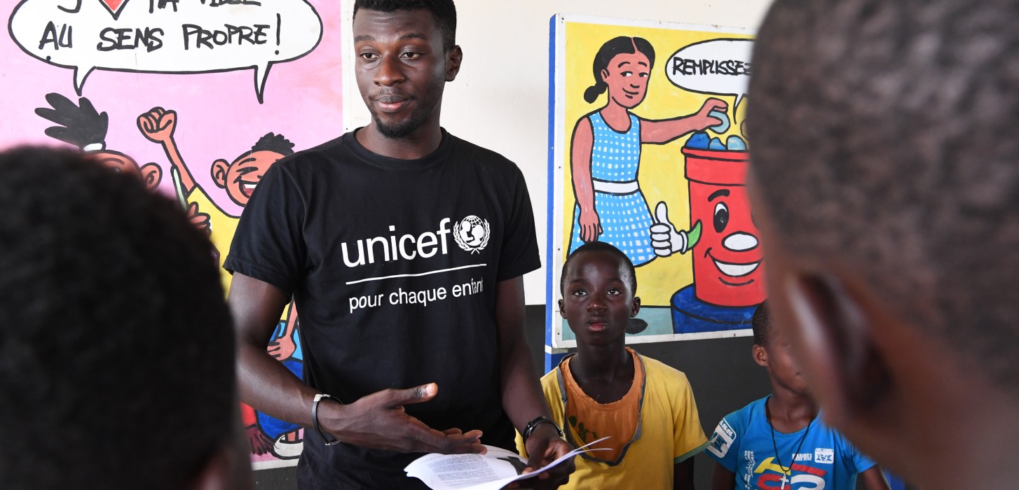 Kherann Yao, UNICEF ambassador, with his students in the Green Schools project, back in 2019