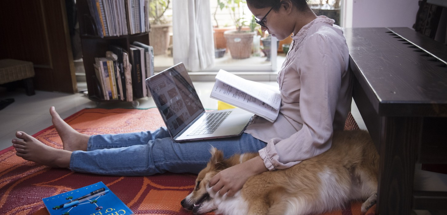 Agnidrohee Spondon, a grade 10 student from Bangladesh, aged 17 years doing self-study at home during quarantine to keep up her academic progress.