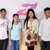 Students of Jazbaat Foundation standing with Founder Arpita Chowdhury