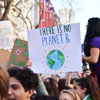 A placard reads "There is no planet B" at a youth protest.