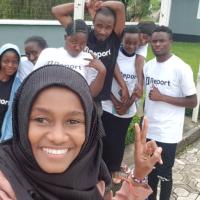 A selfie of Mariam with a group of U-Reporters from Tanzania
